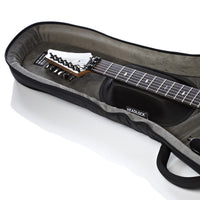 A guitar inside an open padded gig bag on a clean white background. The gig bag is black with a gray interior and a visible HEADLOCK brand label.