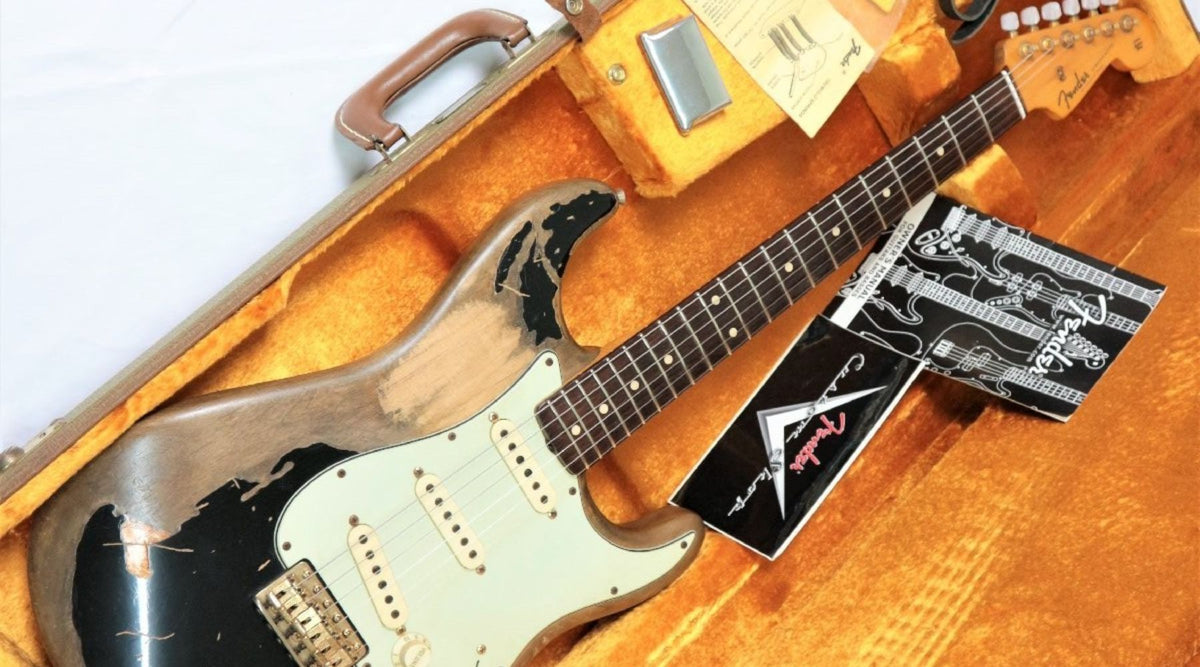 Fender Custom Shop super heavy relic black 1963 Stratocaster guitar inside vintage orange hard case with original paperwork
