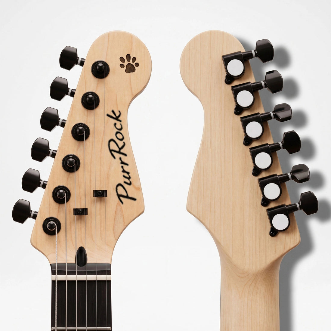 Close-up of two natural wood guitar headstocks shown side by side against a light gray background, one displaying the front with six black tuning pegs and the other showing the back with six black tuning pegs. The headstock features a paw print logo and the text &