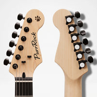 Close-up of two natural wood guitar headstocks shown side by side against a light gray background, one displaying the front with six black tuning pegs and the other showing the back with six black tuning pegs. The headstock features a paw print logo and the text 'PurrRock'.