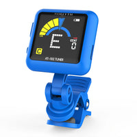 A blue Norlyth AT-102 digital guitar tuner with a clip-on stand, featuring a black display screen with yellow and blue interface graphics, shown on a solid white background.